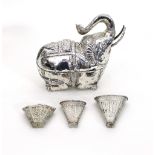 A Chinese export white metal betel leaf holder, embossed flowers and birds, 9cm high,