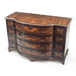 A Dutch mahogany and floral marquetry bowfront chest with four long graduated drawers flanked by