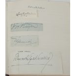 A collection of autographs pasted into an exercise book with many loose signatures,