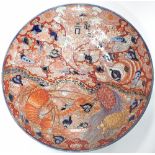 A 19th Century Japanese Imari charger, decorated with lobsters, shells and tortoises,