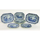 Five Nankin blue and white rectangular graduated dishes, various scenes, the largest 35cm wide,