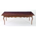 A 19th Century fruitwood low table with feathered veneered top on four cabriole legs,