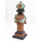 A 19th Century Italian majolica type urn and cover,