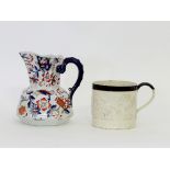 A 19th Century Staffordshire mug, moulded with a hunting scene,