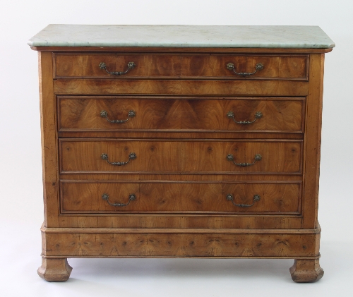 A French 19th Century walnut commode, the white marble top with canted corners,