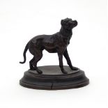 A small bronze model of a dog,