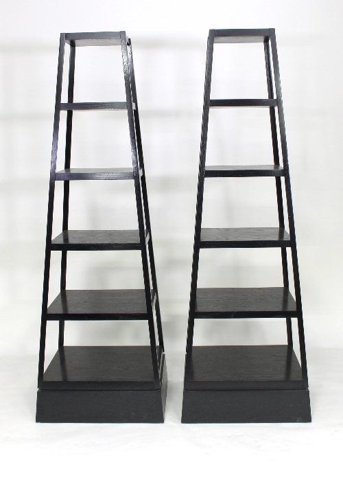 A pair of six-tier tower display shelves, of tapering design,