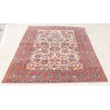 An Agra carpet with camel coloured central medallion,