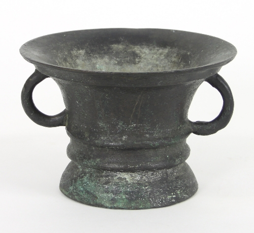 A late 17th Century/early 18th Century bronze mortar with loop handles