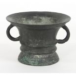 A late 17th Century/early 18th Century bronze mortar with loop handles