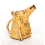 Ewenny Pottery/A novelty pig jug, early 20th century, modelled with a zoomorphic conical spout,