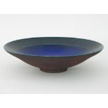 Peter Sparrey/A stoneware Raku fired bowl,