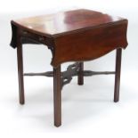 A mahogany supper table of late 18th Century design,