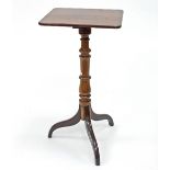 A late 19th Century mahogany and walnut tripod table,