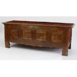 An early 19th Century oak chest, with fruitwood inlay,