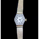A lady's 18ct gold cased wristwatch, the hexagonal silvered dial with Arabic numerals,
