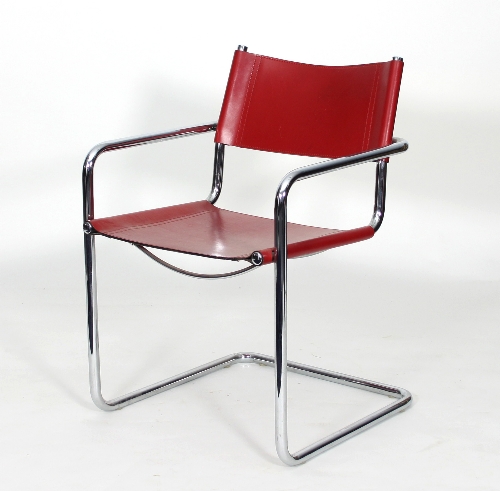 A chrome cantilever frame chair with red leather seat and back stamped Matteo Grassi