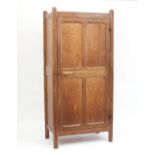 Gordon Russell, circa 1920s/A Stow single oak wardrobe, with panelled front and sides,