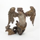 A late 17th Century Italian carved limewood figure of a winged mermaid with polychrome decoration,