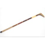 A specimen wood walking stick,