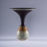 Graham James/A large stoneware bottle vase with flared rim and ringed decoration,