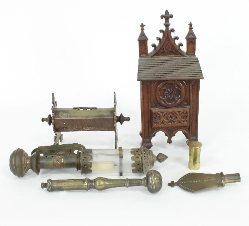 A brass offertory box of octagonal form with pierced brass supports,