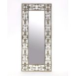 A gilt metal framed wall mirror,