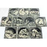 A collection of ten Minton tiles printed scenes from Aesop's Fables in black and white,