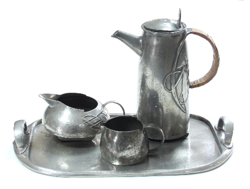 Archibald Knox for Liberty/A Tudric pewter matched tea set with twin-handled tray,