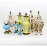 Two pairs of ceramic table lamps and five other lamps