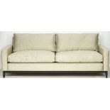 A large sofa upholstered in J Robert Scott heavy Bengaline silk, on square tapering legs,