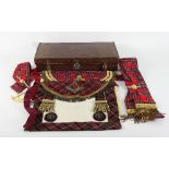 A leather case containing Masonic apron and other regalia