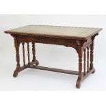 A walnut writing desk retailed by James Philip, with green tooled leather inset top,