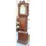 An early 19th Century oak and mahogany longcase clock,