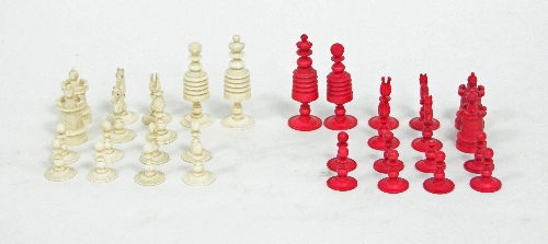 A Chinese red stained and white ivory chess set,