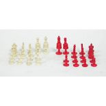 A Chinese red stained and white ivory chess set,