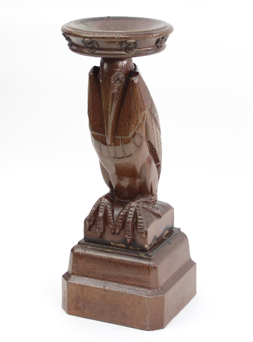 A stoneware pelican birdbath, possibly retailed by Liberty, in allover brown salt glaze,