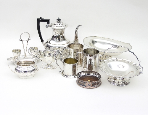 A quantity of silver plated wares including two fruit stands, a hot water jug, two mugs, etc.