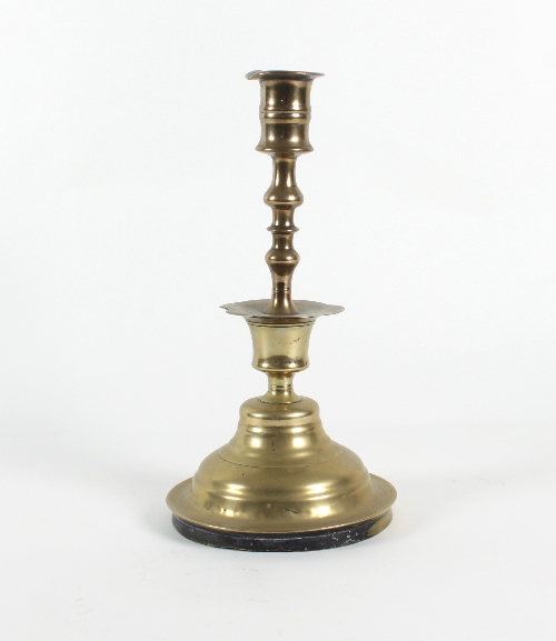 A 17th Century style Dutch brass candlestick,