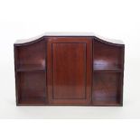 A set of mahogany wall shelves,