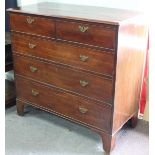 A George III mahogany chest, fitted three long and two short drawers on bracket feet,