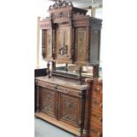 A late 19th Century walnut sideboard,