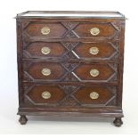 A Jacobean style oak moulded front chest of drawers,
