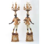 A pair of 19th Century Italian candelabra blackamoors,