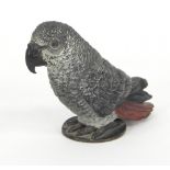A cold painted bronze figure of a parrot,