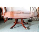 A 20th Century mahogany circular dining table by William Tillman,
