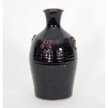 Russell Collins/A stoneware Tenmoku bottle,
