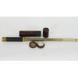 A three-draw brass telescope with leather case and an aneroid barometer in a leather case