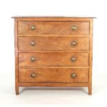 Gordon Russell, 1926/An elm and cedar wood chest of four long drawers, design No 266,