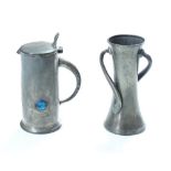 Archibald Knox for Liberty/A Tudric pewter jug, with enamelled boss to front and embossed spandrels,
